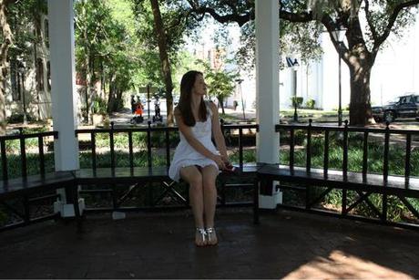 Five reasons to post this photograph:

1. Look, a pretty gazebo!
2. I really love the dress I’m wearing, which you can also buy from Zara. 
3. The shadows trick the eye into believing that I am actually tan. 
4. Neon pink toenails are the shit. 
5. My legs are angled in such a way that my cankers are concealed. 

And no, you cannot see my underwear.