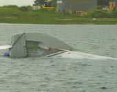 Capsized Sailboat