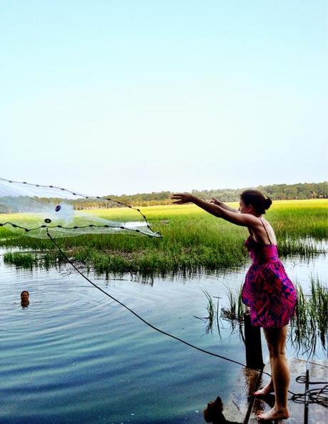 Casting a shrimp net. I caught a few reeds.