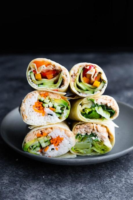 stack of six salmon wraps on a plate