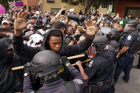 Police confront protesters in downtown Louisville