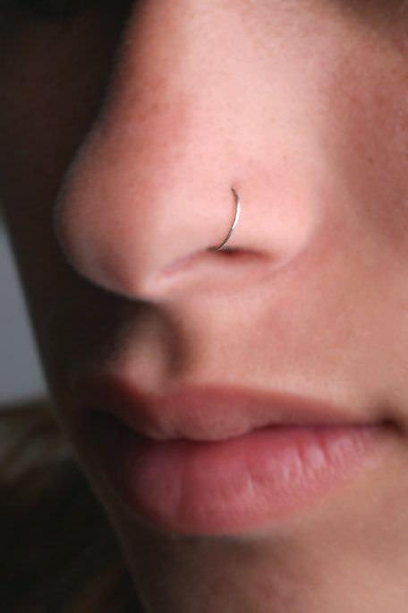 Nose Piercing Bump: 6 Causes and How To Treat Them