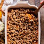 This Vegan Sweet Potato Casserole with Gluten-Free Pecan Crumble recipe is the best sweet potato casserole ever! It's made with fresh yams and coconut sugar for subtle sweetness. With a crispy gluten-free pecan crumble topping, you'll definitely be serving yourself seconds. It's easy to make the day of, or can be prepared in advance for an easy make-ahead holiday side dish.