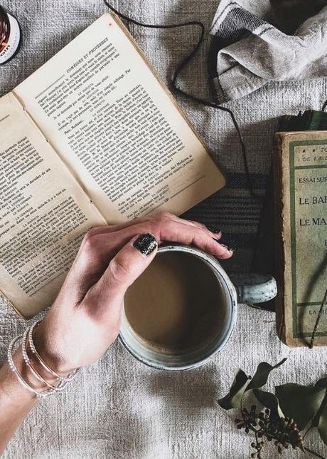 hand holding a cup of tea