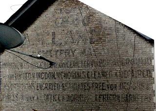 A ghostsign in New Soutgate – Lander, monumental mason
