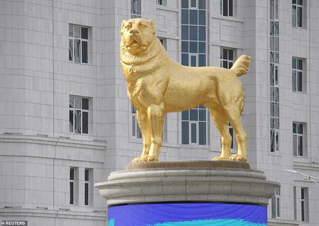 Golden statue for Alabai dog in the centre of the road !!