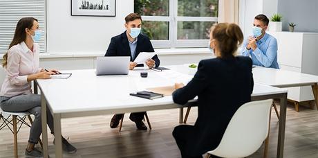 all staff wearing protective mask on the meeting