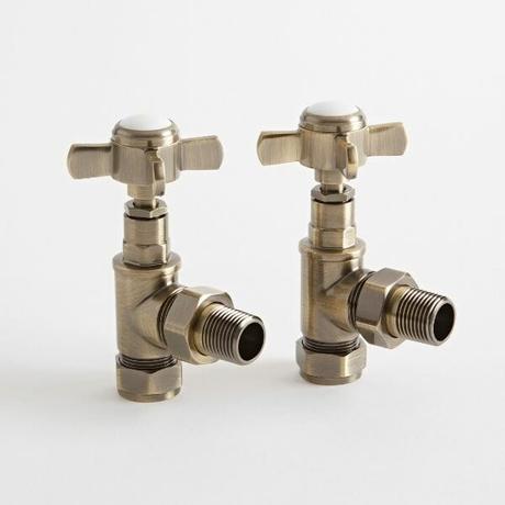 cut out image of traditional brass radiator valves