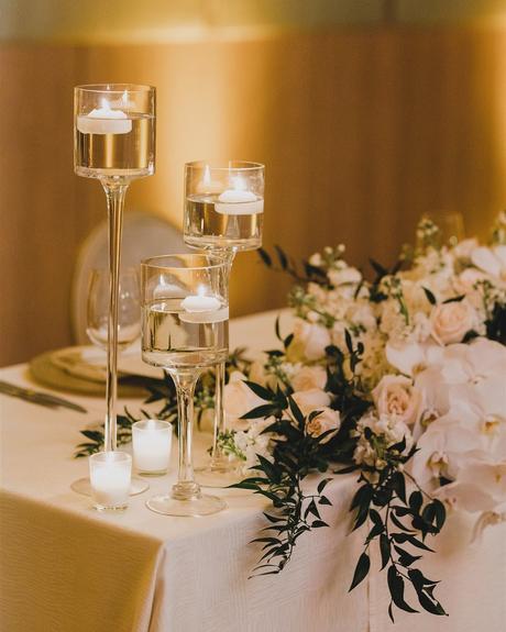 real wedding decor candle greenety ivory gold bayfront flora