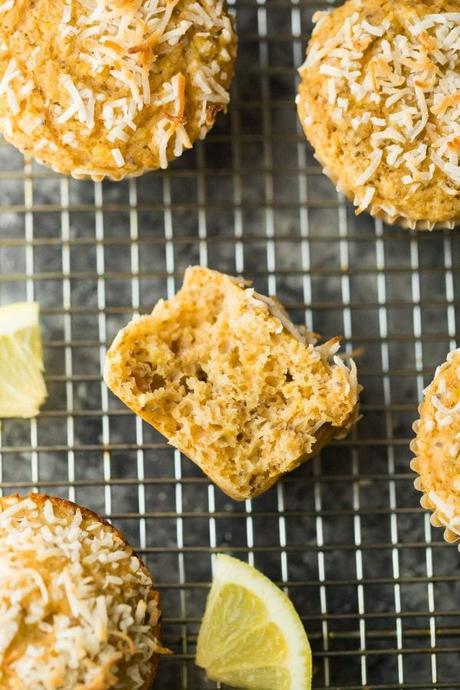 Lemon Chia Yogurt Muffins cooling on wire rack with lemon slices