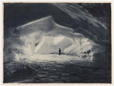 Early photography: Cavern carved by the sea in an ice wall near Commonwealth Bay – Frank Hurley