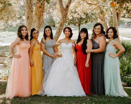 Bride with bridesmaids posing at Coyote Hills Golf Course Wedding venue
