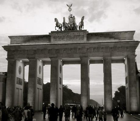 Brandenburg Gate at dusk. Berlin isn’t necessarily a...