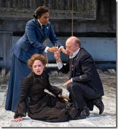 clockwise from bottom) Masha (Carrie Coon) is comforted by her sister Olga (ensemble member Ora Jones) and husband Kulygin (ensemble member Yasen Peyankov) in Steppenwolf Theatre Company’s production of Anton Chekhov’s Three Sisters, adapted by ensemble member Tracy Letts, directed by ensemble member Anna D. Shapiro. 