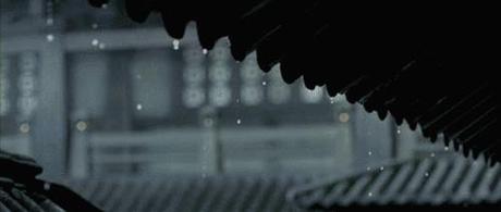 Moving animated rain drops dripping from awning during rainstorm animated gif