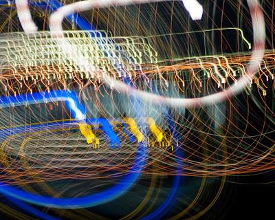 City lights on the sly, round and round [blue sky night]