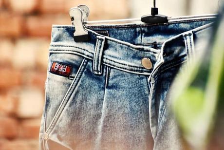 blue-denim-jeans-on-hanger