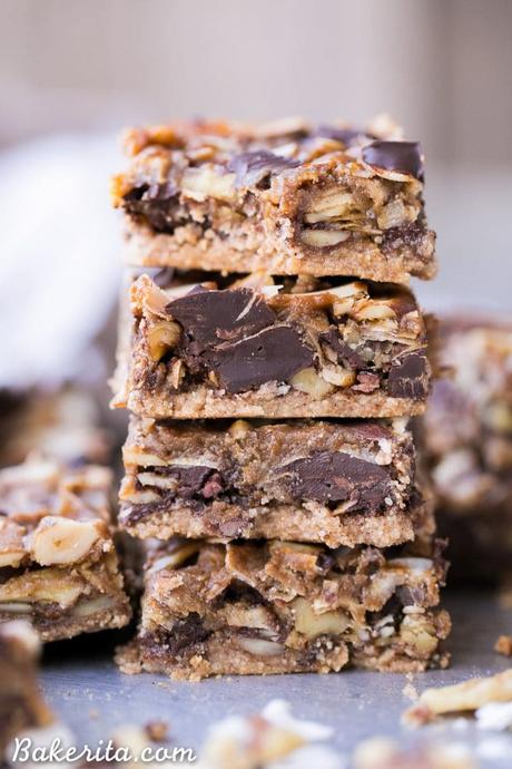 These Paleo Magic Cookie Bars are just as rich and delicious as the classic seven layer bars you know and love! This gluten-free, vegan, and refined sugar free version has an almond flour crust and homemade coconut milk caramel.
