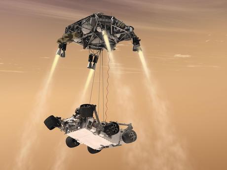 An artist's rendering shows a rocket-powered descent stage lowering the one-ton Curiosity rover to the Mars surface