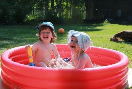 kids-enjoying-in-inflatable-pool