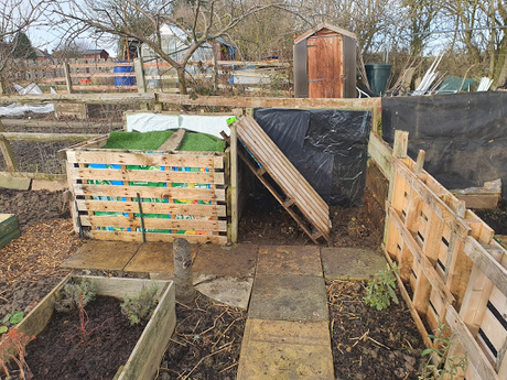 View from the allotment and the turn of the compost.