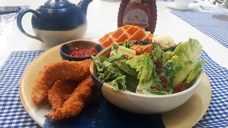 waffle, breaded chicken, and salad