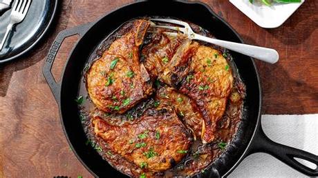 This recipe for thin sliced pork chops has a basic seasoning, are pan seared and are topped with an easy pan sauce. Smothered Pork Chops Recipe - NYT Cooking