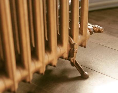 Vintage gold cast iron radiator