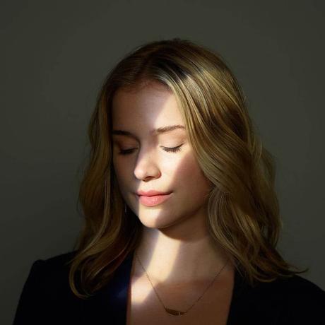 Exclusive. “You” Star Elizabeth Lail on Skincare and Instagram Stalking