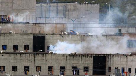scores of people die in prison riots in Ecuador