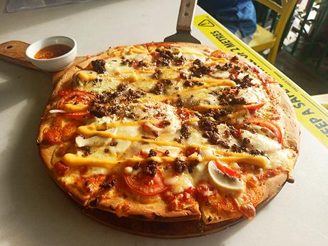 emcaro pizza by Yellow Lantern Cafe