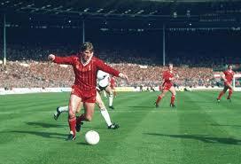 Liverpool player manager kenny dalglish wearing a long adidas jacket shouts from the touchline as steve mcmahon and steve staunton look on from the. The King And I How Kenny Dalglish Turned Discord Into Harmony