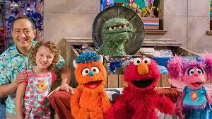 One of the photos shows elmo in a standing position with a white background, that led me to. Sesame Street Abc Iview