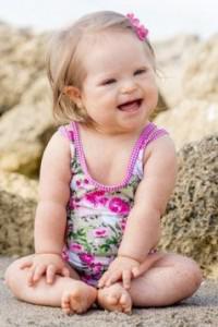 Model With Down Syndrome to Head Up Kids Swimwear Catalog