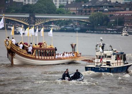 The Olympic barge heads up the Thames to Opening Ceremony