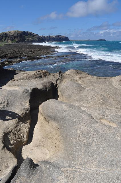 Blacking Out the Friction in Kapurpurawan Rock Formation