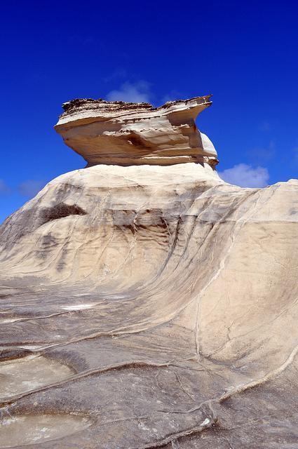 Blacking Out the Friction in Kapurpurawan Rock Formation