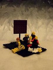 lego men on raft