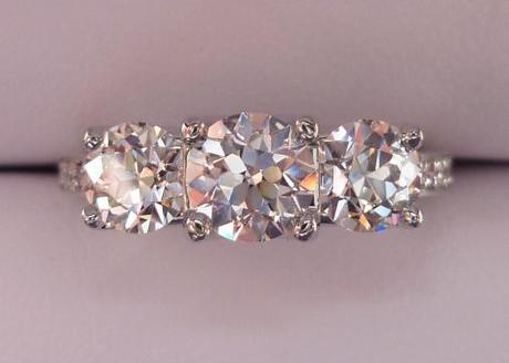 August Vintage Round Diamond Three-Stone Ring