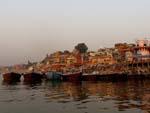 Boats lined up on the Ganga with the ghats in the background
