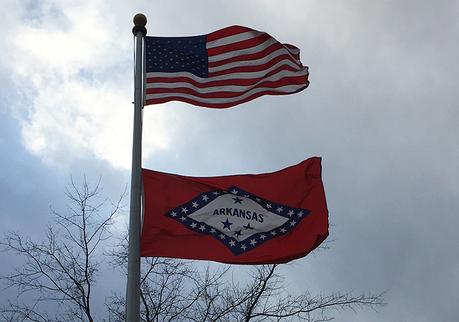 U.S. and Arkansas flags
