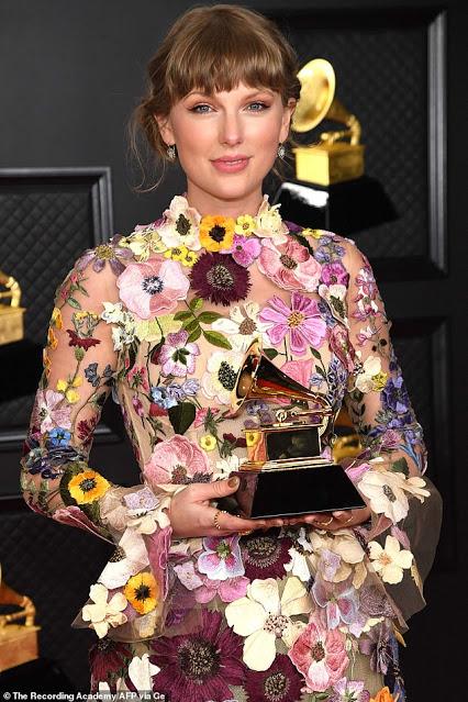 Grammy winner walks the ramp with floral garment !