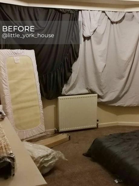 white convector radiator in a bedroom during a renovation