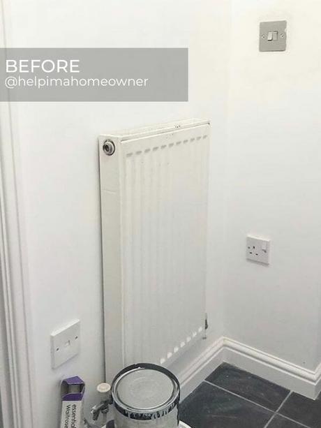 old convector radiator in a corner