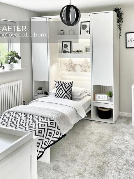 white column central heating radiator in a modern bedroom