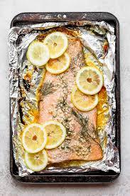 My dad loves salmon so i thought i would try this version in the foil pack since sometimes when i cook right in the oven it seems dry this came out wonderful very tender and flavorful. Baked Salmon In Foil With Lemon Dill Fit Foodie Finds