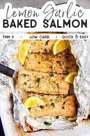 Salmon does well being wrapped in foil while it is cooking as it retains the flavors of the aromatics used during the cooking process. Lemon Garlic Butter Salmon Baked In Foil Thm S Thm S Low Carb Keto Gf