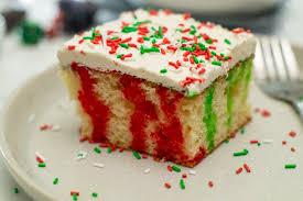 Everyone, young and old will love this adorable cake and the kids will be excited to help make it too! Christmas Poke Cake Moore Or Less Cooking