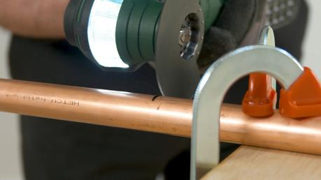 Cutting the Copper Pipe Using A Multi-Functional Tool