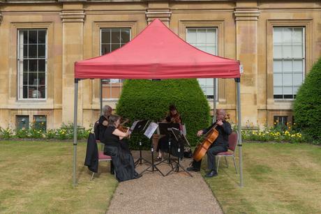 Can a string quartet play outdoors?